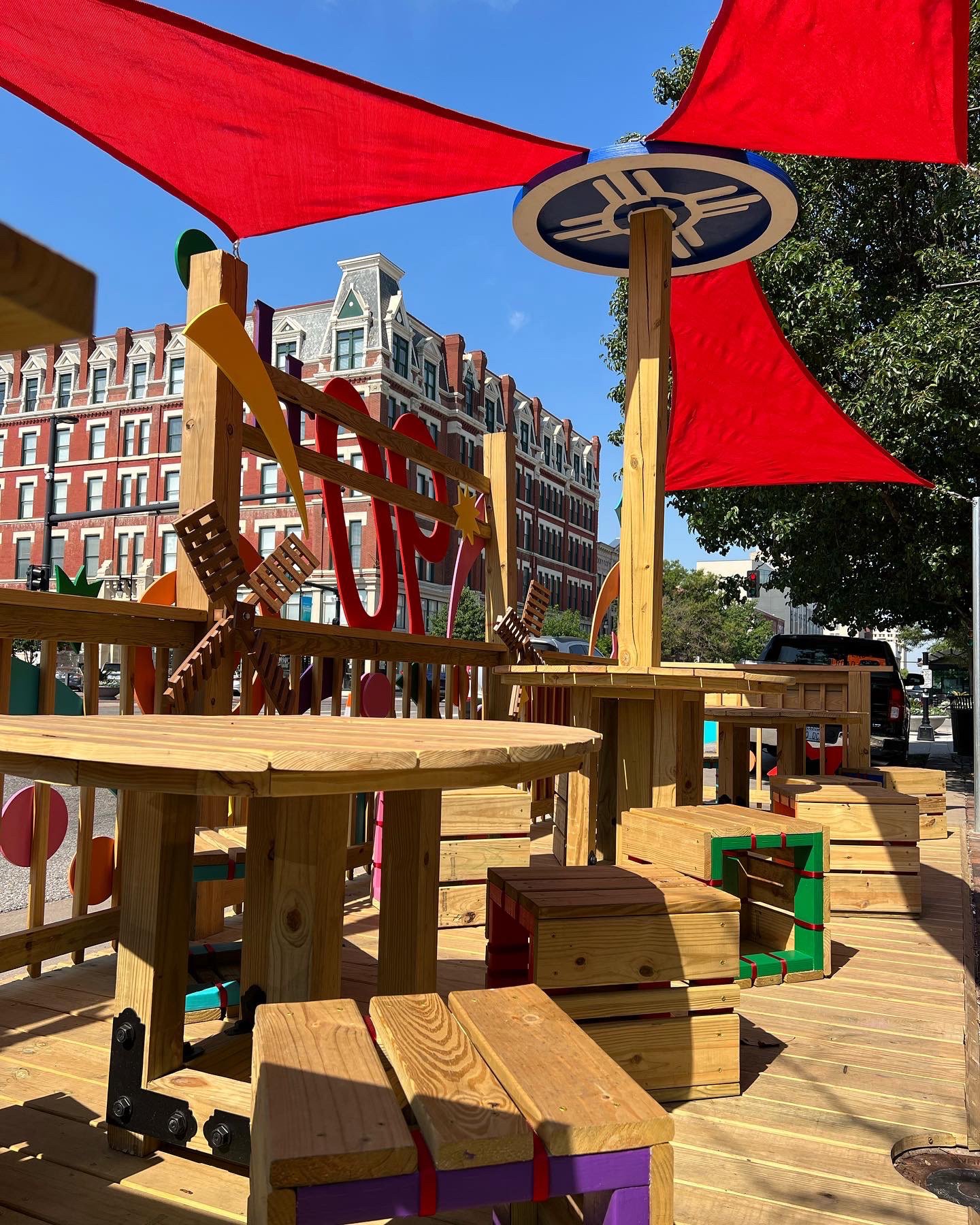 Portfolio | Sarah Myose — Art & Marketing Work Wooden design pieces installed on the Old Mill Front Porch