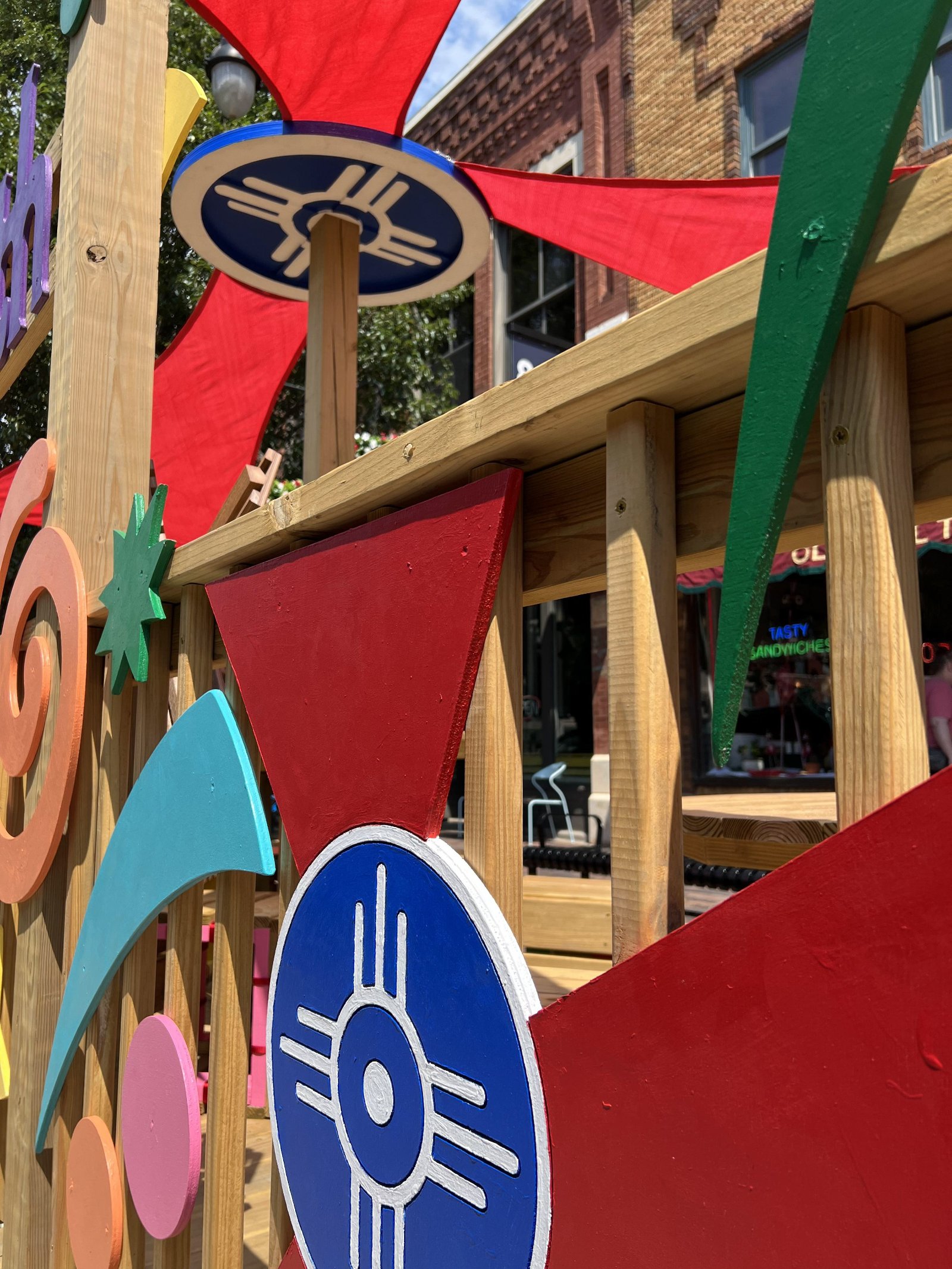 Portfolio | Sarah Myose — Art & Marketing Work Wooden cutout design detail on the Front Porch